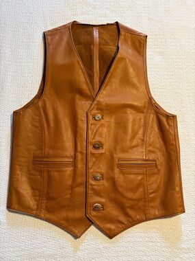 Men’s handmade tan leather vest, circa 1970s